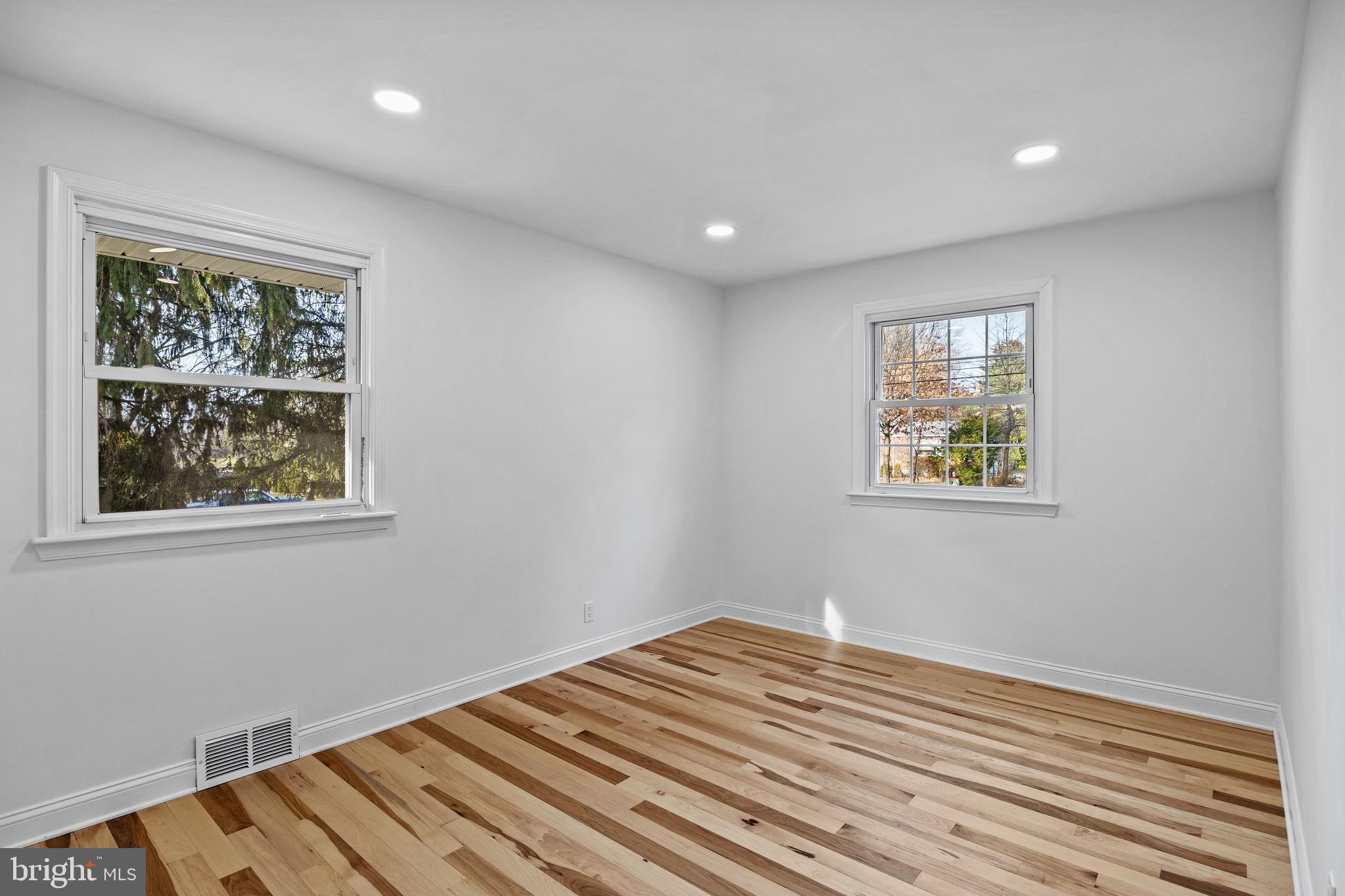 1221 Huntingdon Pike Huntingdon Valley, PA 19006 - Photo 21 of 48 a view of a room with wooden floor and window