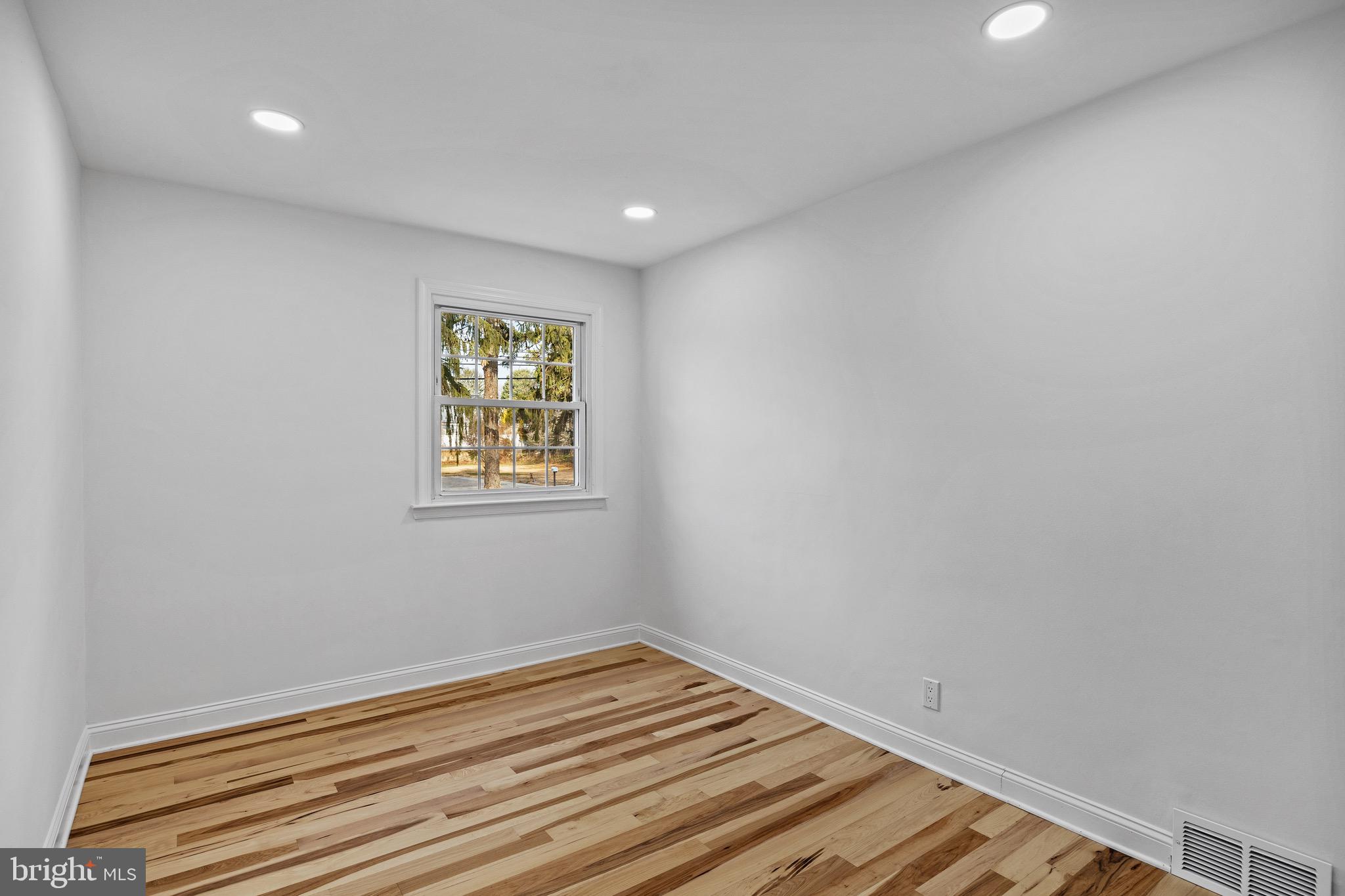 1221 Huntingdon Pike Huntingdon Valley, PA 19006 - Photo 23 of 48 a view of room with window and wooden floor