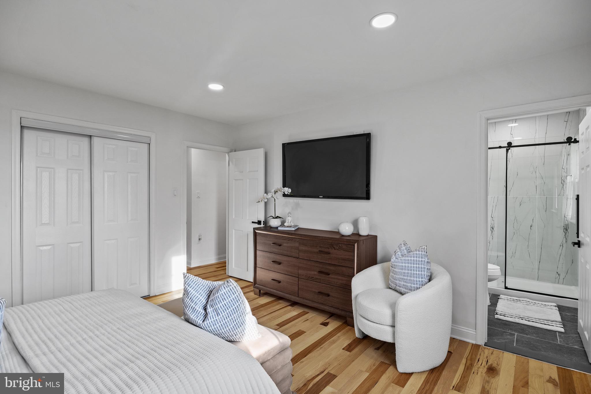 1221 Huntingdon Pike Huntingdon Valley, PA 19006 - Photo 25 of 48 a bedroom with a bed and a flat screen tv