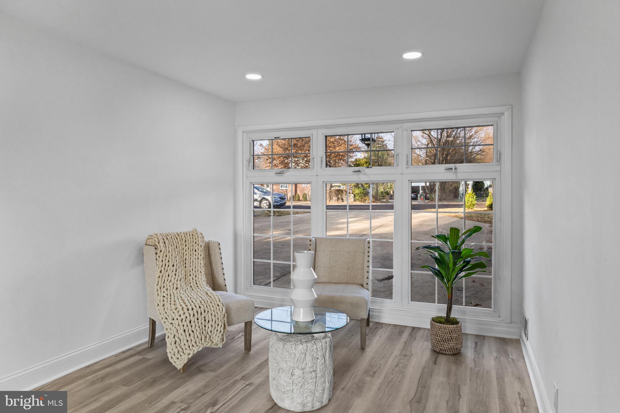 1221 Huntingdon Pike Huntingdon Valley, PA 19006 - Photo 30 of 48 a living room with furniture and a potted plant