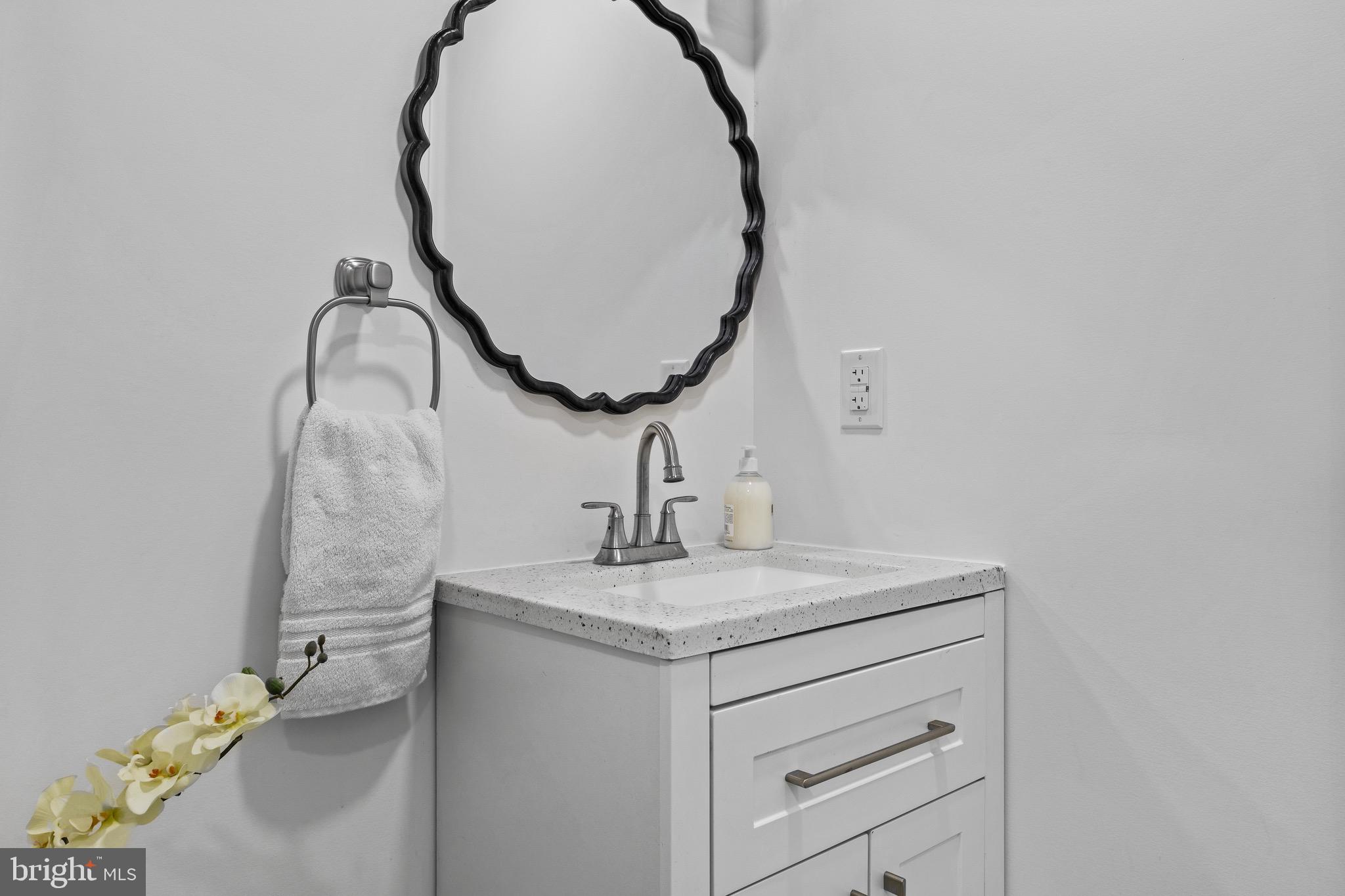 1221 Huntingdon Pike Huntingdon Valley, PA 19006 - Photo 32 of 48 a bathroom with a sink and a mirror