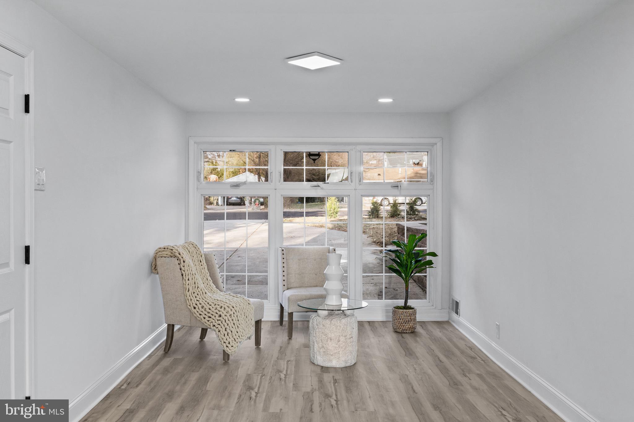 1221 Huntingdon Pike Huntingdon Valley, PA 19006 - Photo 34 of 48 a dining room with furniture and wooden floor