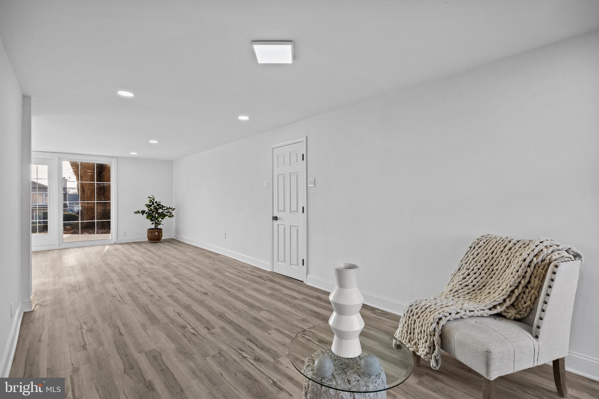 1221 Huntingdon Pike Huntingdon Valley, PA 19006 - Photo 35 of 48 a living room with furniture and wooden floor