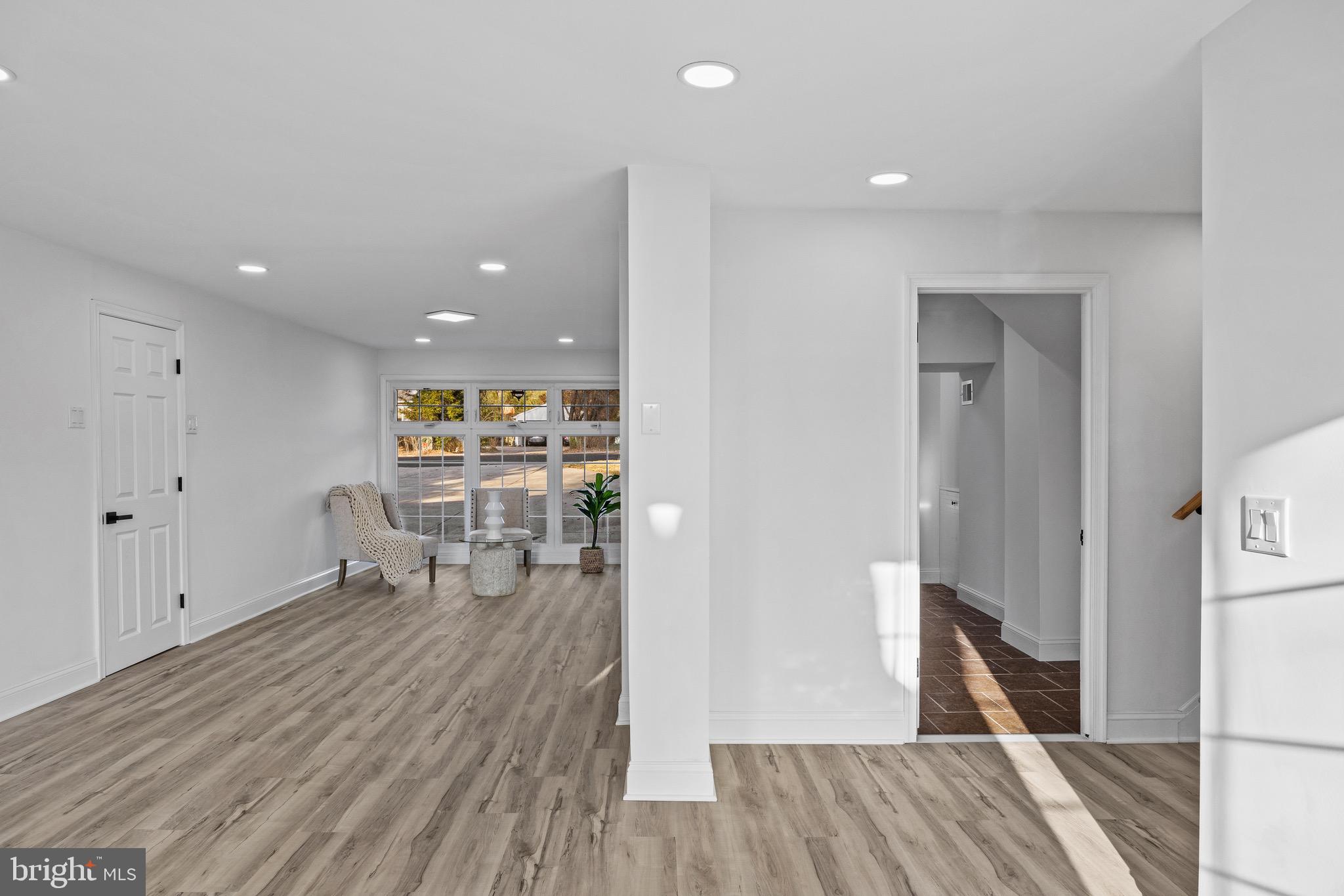 1221 Huntingdon Pike Huntingdon Valley, PA 19006 - Photo 37 of 48 a living room with furniture and a wooden floor