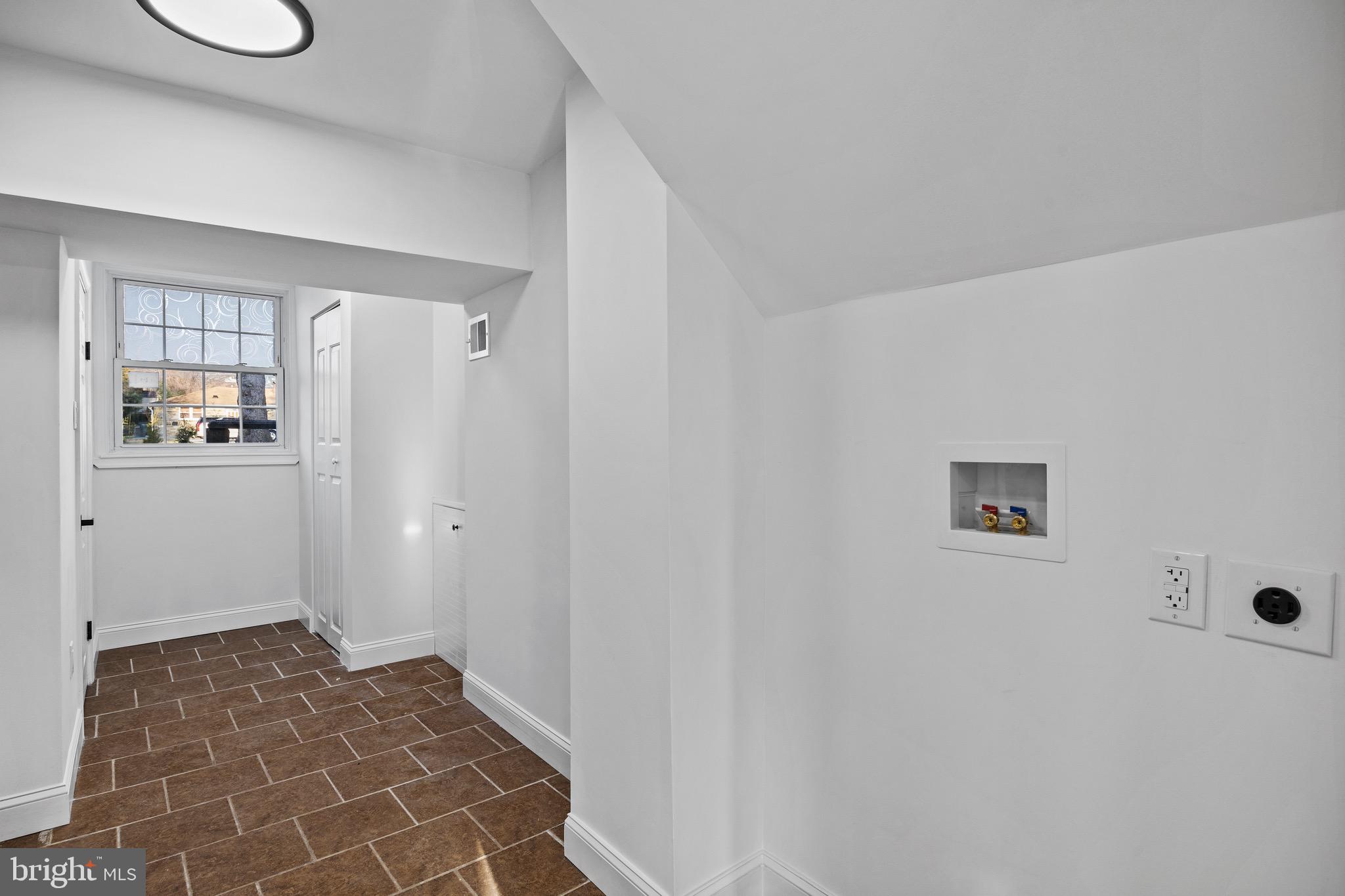 1221 Huntingdon Pike Huntingdon Valley, PA 19006 - Photo 38 of 48 a view of a hallway with bathroom