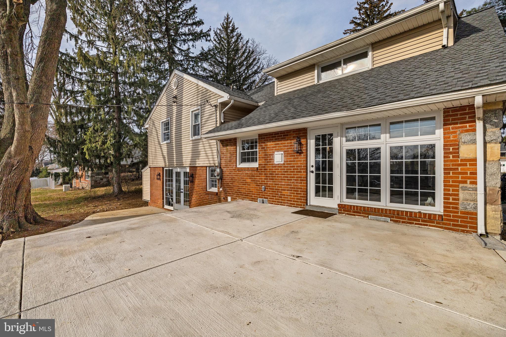 1221 Huntingdon Pike Huntingdon Valley, PA 19006 - Photo 40 of 48 a front view of a house with a garage
