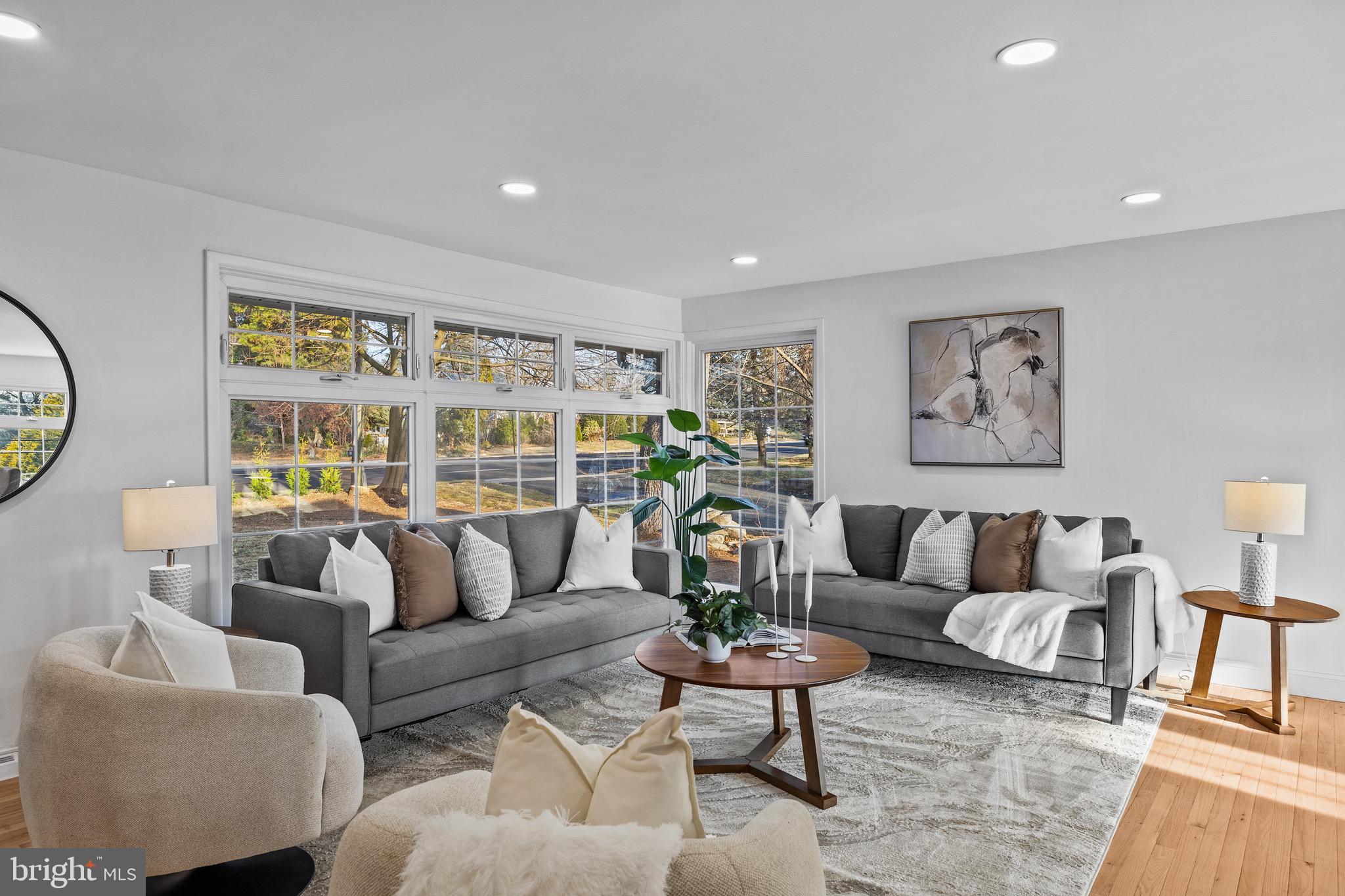 1221 Huntingdon Pike Huntingdon Valley, PA 19006 - Photo 9 of 48 a living room with furniture and a large window
