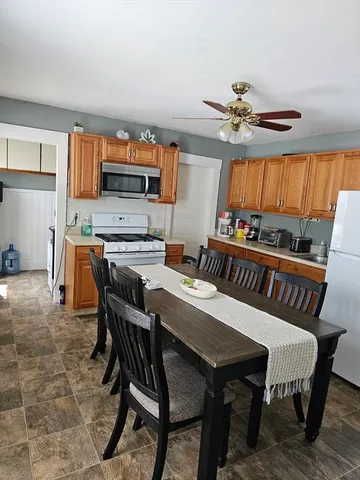 a view of a dining room with furniture