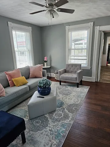 a living room with furniture and a couch