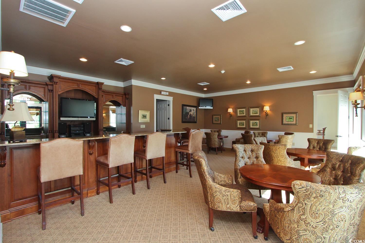 655 Millbrook Road Georgetown, SC 29440 - Photo 13 of 21 Dining area featuring crown molding and light colo