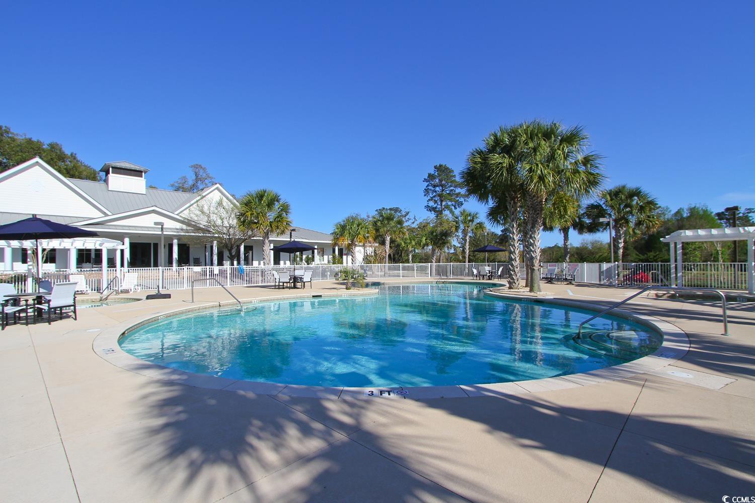 655 Millbrook Road Georgetown, SC 29440 - Photo 18 of 21 View of pool featuring a pergola and a patio