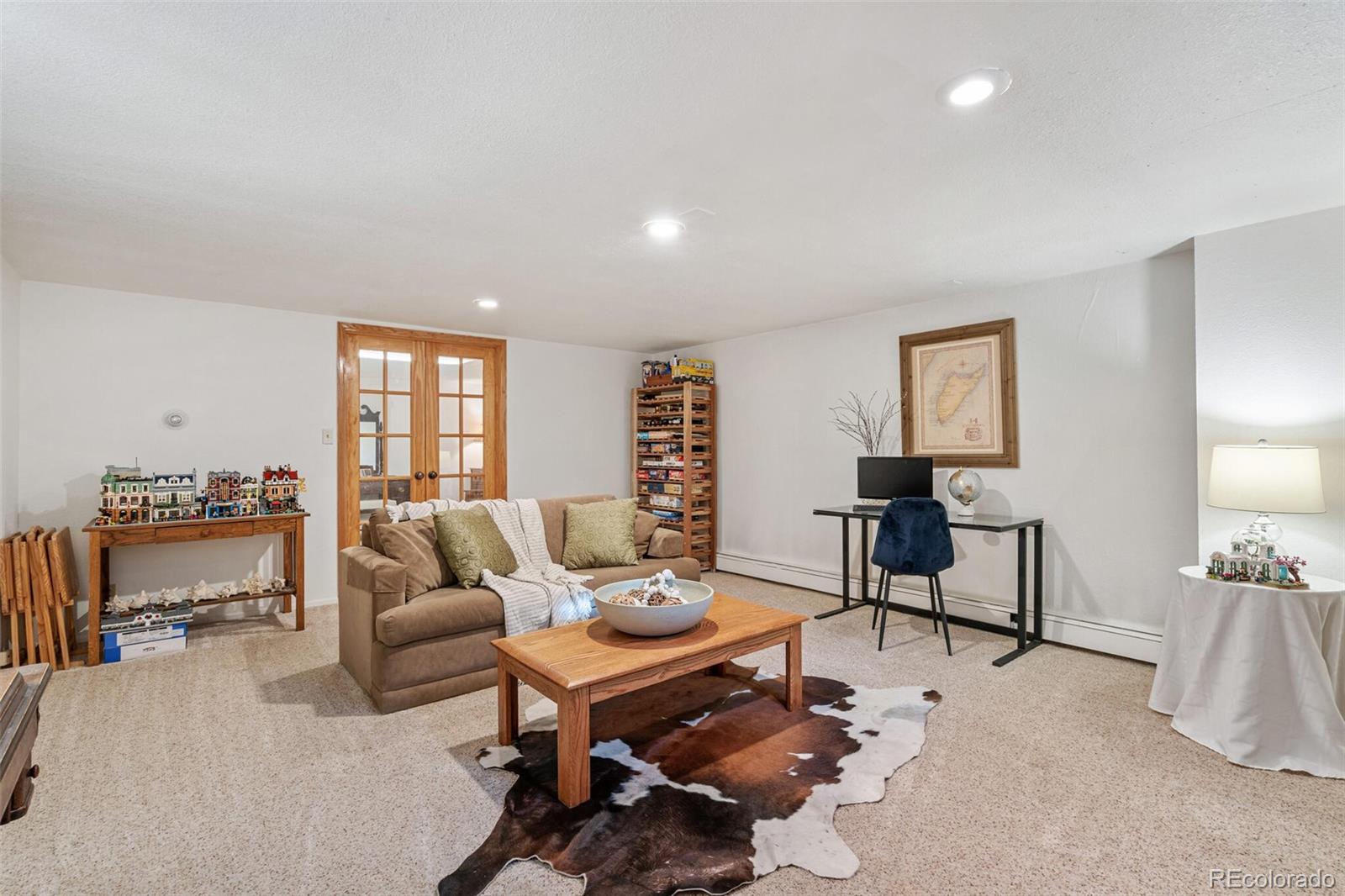 4155 Ingalls Street Wheat Ridge, CO 80033 - Photo 24 of 47 a living room with furniture and a potted plant