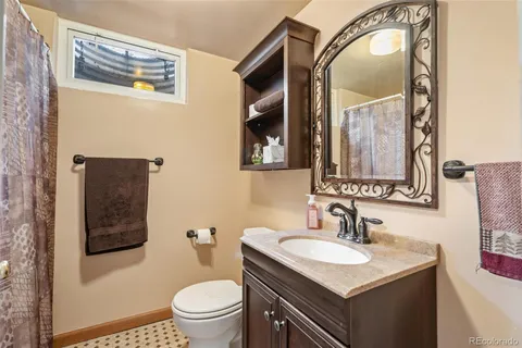 a workspace with furniture and mirror