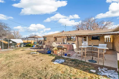a view of a chairs and tables in patio
