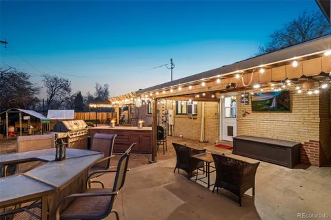 a view of a swimming pool with a patio