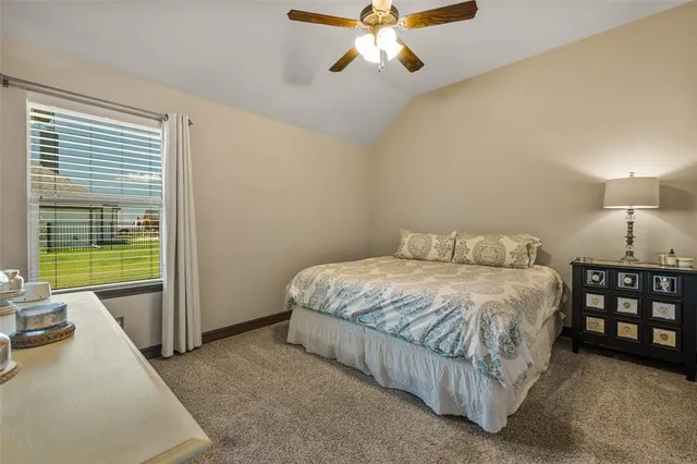 a bathroom with double sink and a mirror