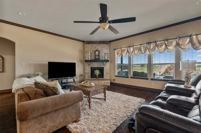 a dining table with chairs and window