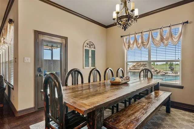 a large kitchen with kitchen island a sink stainless steel appliances and cabinets