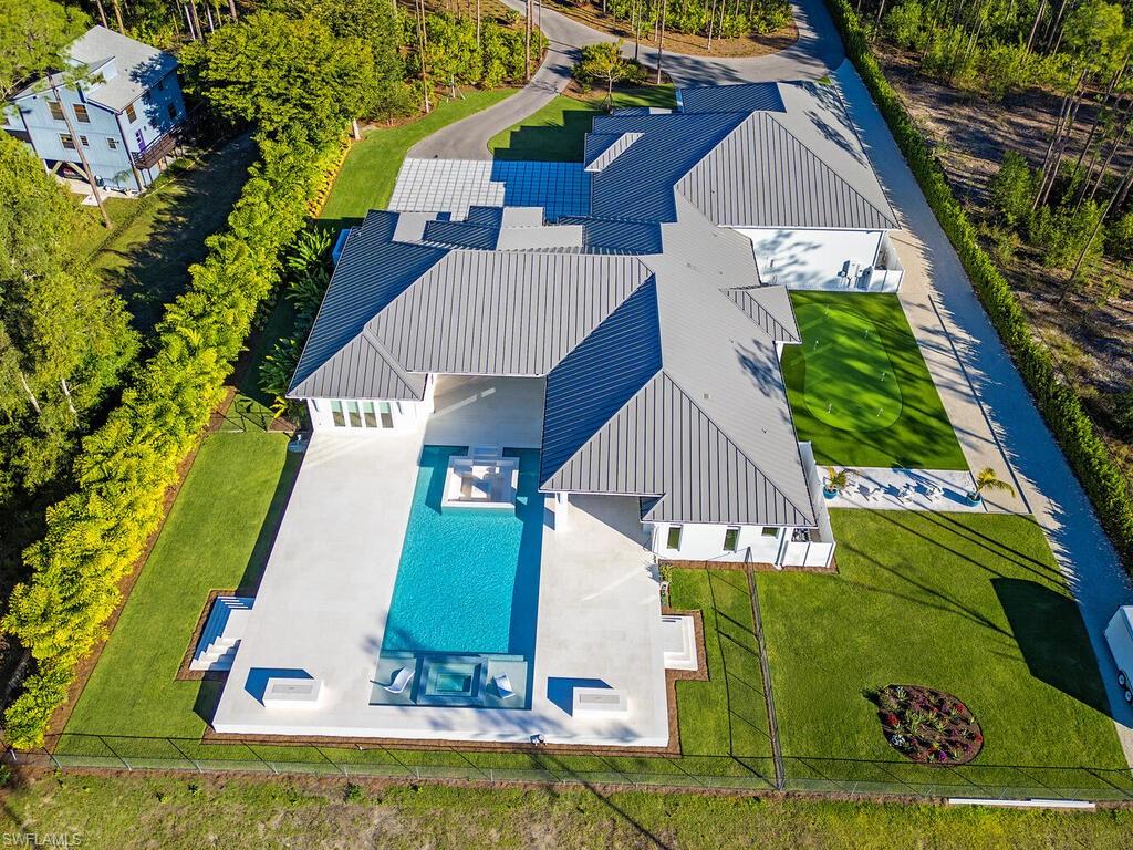 6824 Sable Ridge Lane Naples, FL 34109 - Photo 2 of 36 a aerial view of a house
