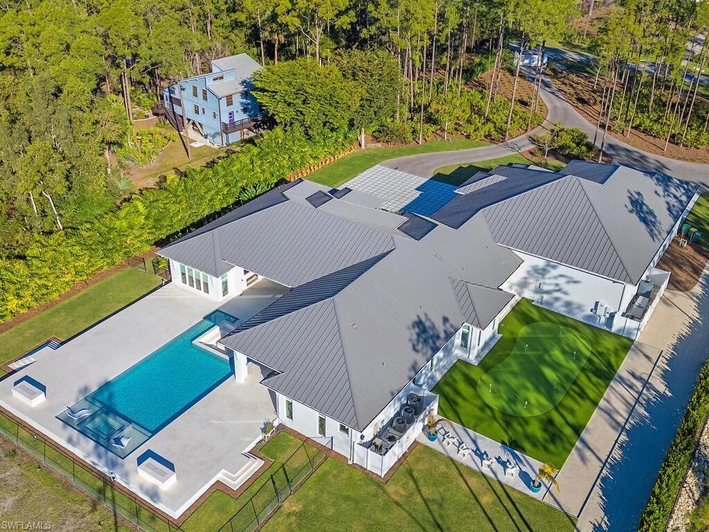 6824 Sable Ridge Lane Naples, FL 34109 - Photo 33 of 36 an aerial view of a house