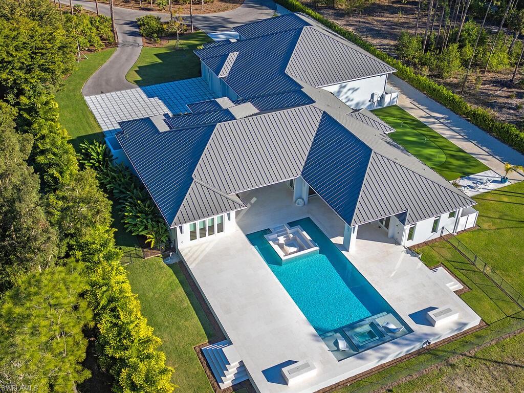 6824 Sable Ridge Lane Naples, FL 34109 - Photo 34 of 36 an aerial view of a house