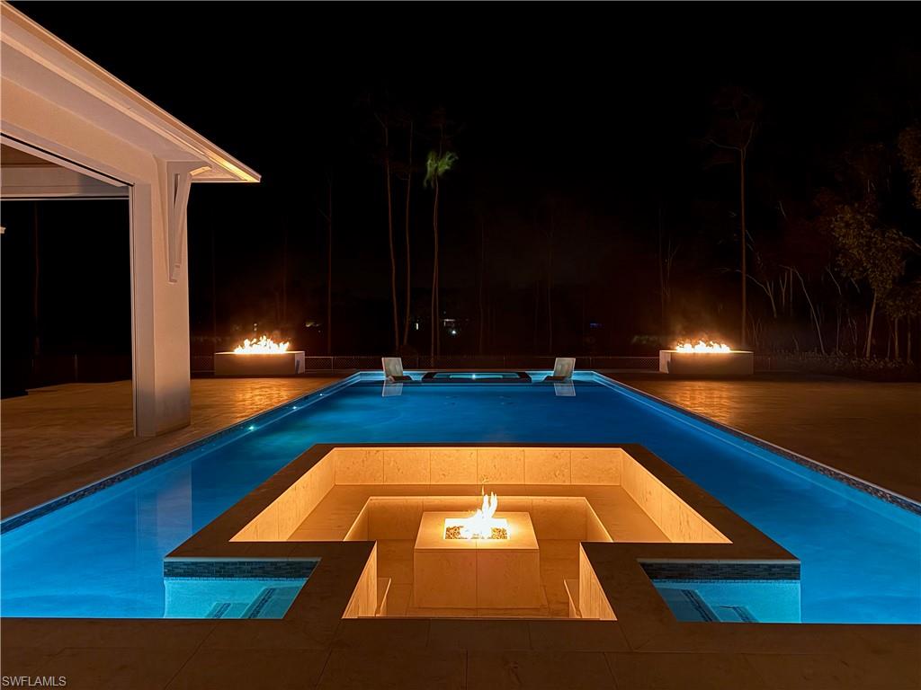 6824 Sable Ridge Lane Naples, FL 34109 - Photo 4 of 36 a view of swimming pool