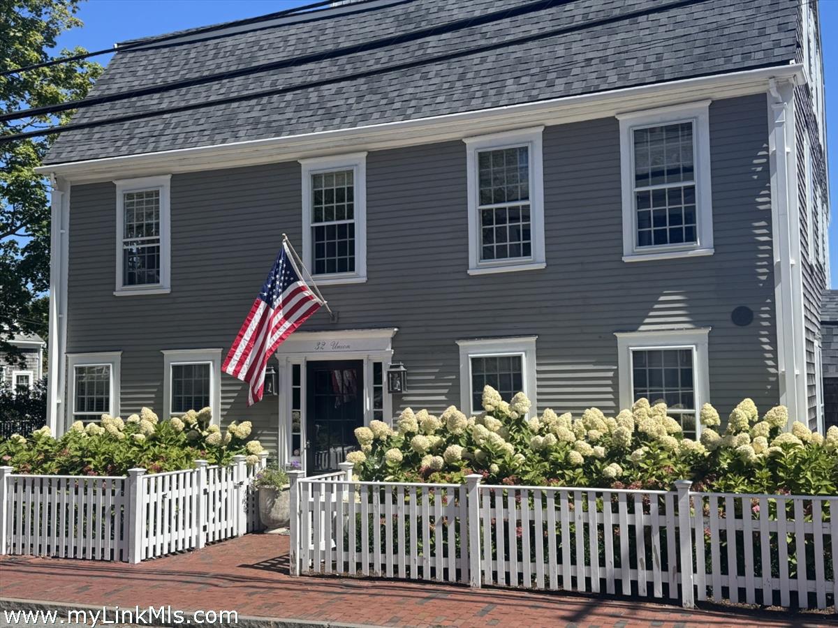 32 Union Street Nantucket, MA 02554 - Photo 1 of 30 a front view of a house having yard