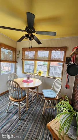 a table and chairs in a balcony