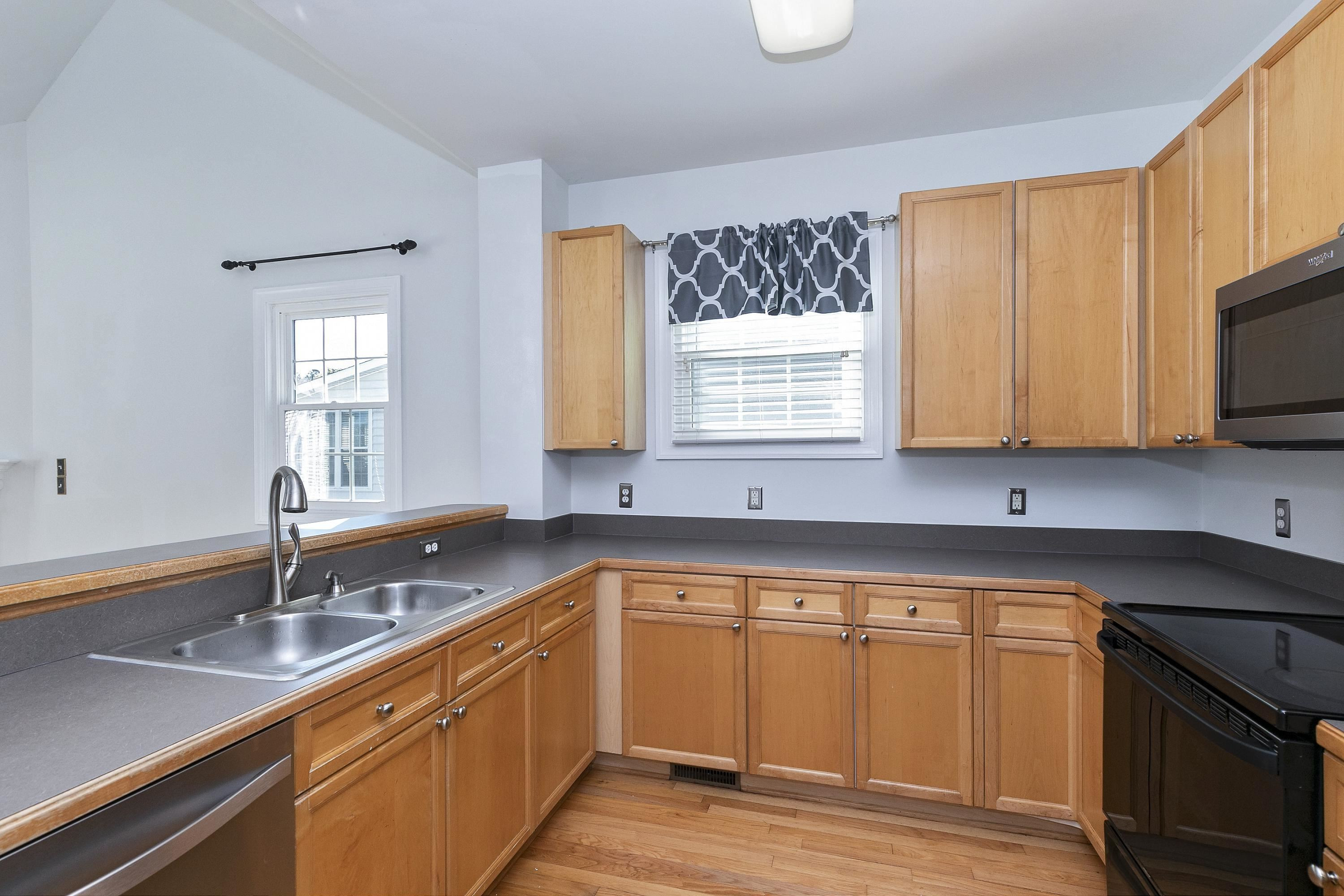 4412 Major Loring Way Raleigh, NC 27616 - Photo 12 of 59 Solid surface counter tops. Refrigerator conveys! Kitchen