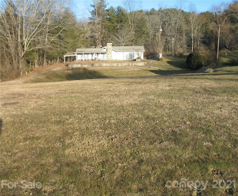 2060 Ridge Road Hendersonville, NC 28792 - Photo 2 of 21 a view of swimming pool with mountain view