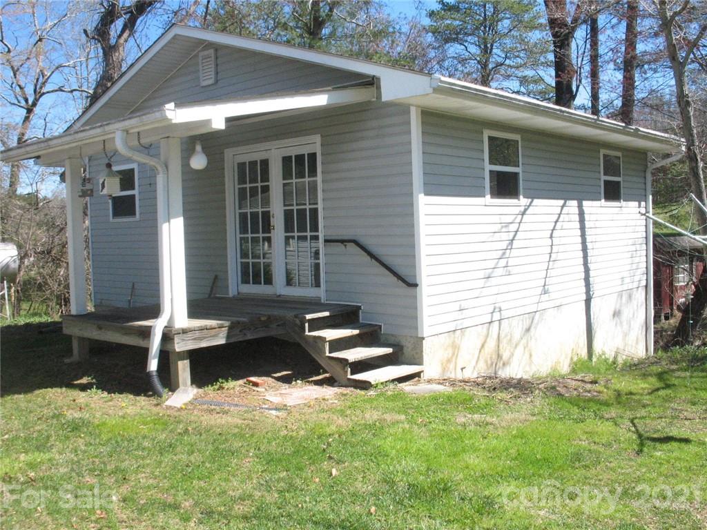 2060 Ridge Road Hendersonville, NC 28792 - Photo 12 of 21 a front view of a house with a yard