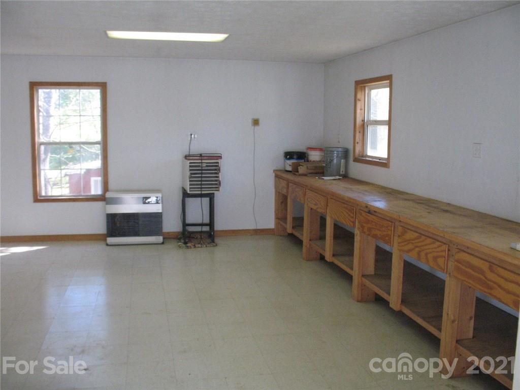 2060 Ridge Road Hendersonville, NC 28792 - Photo 13 of 21 a view of a livingroom with furniture and windows