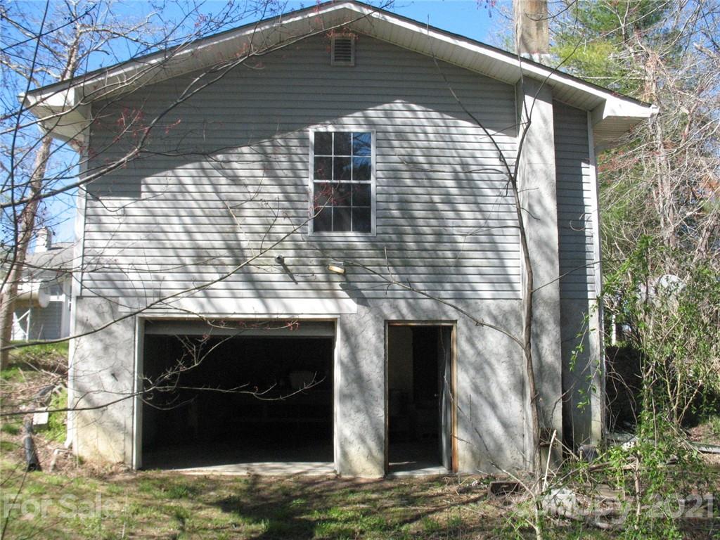 2060 Ridge Road Hendersonville, NC 28792 - Photo 18 of 21 a front view of a house with a yard