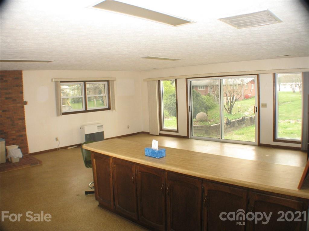 2060 Ridge Road Hendersonville, NC 28792 - Photo 9 of 21 a room with pool table and windows