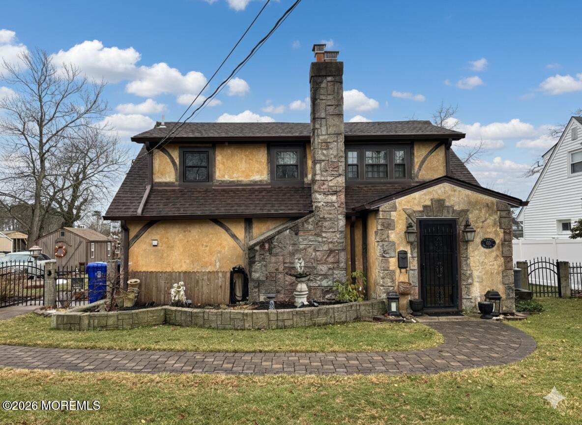 515 Carroll Fox Road Brick, NJ 08724 - Photo 24 of 60 a front view of a house with a yard