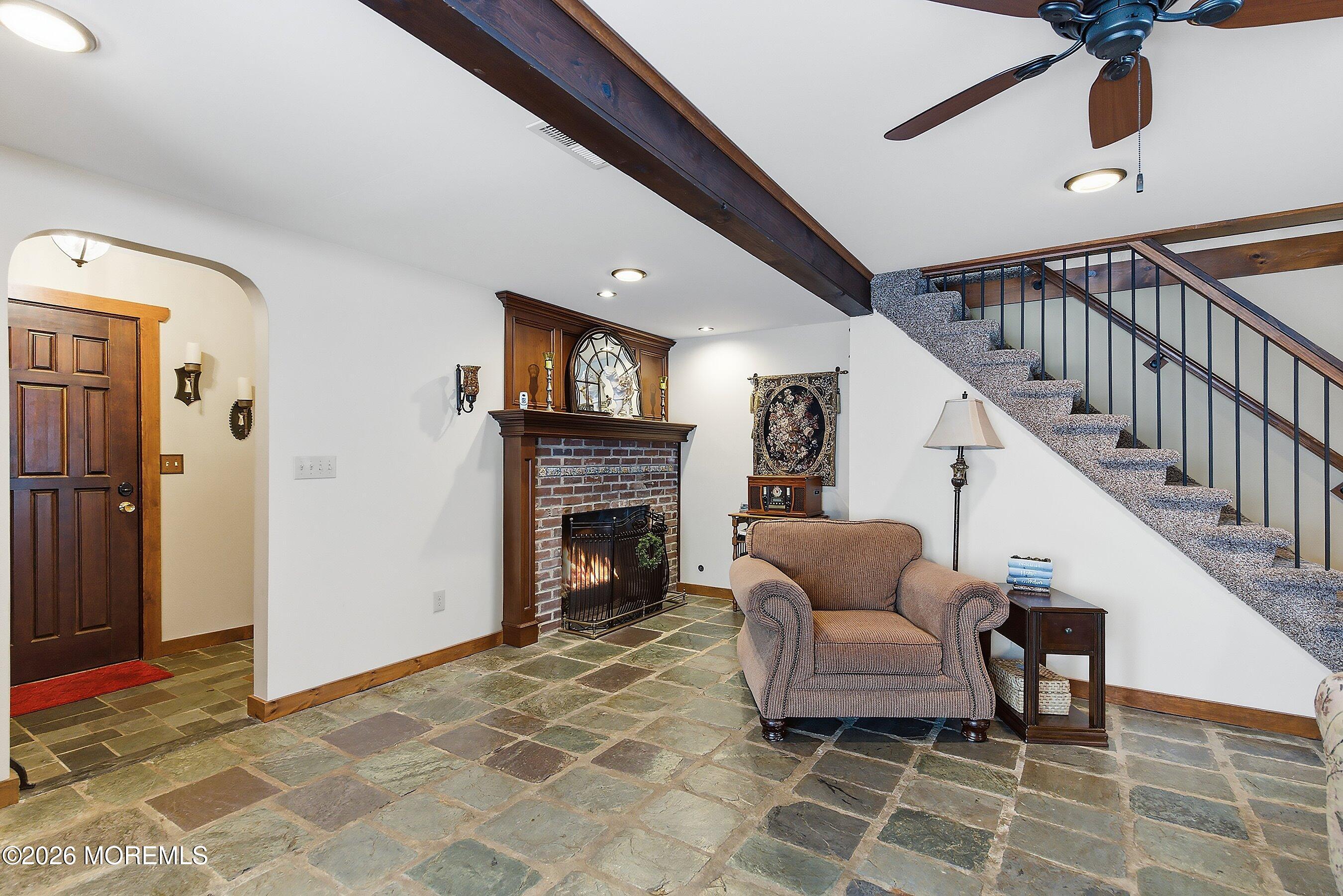 515 Carroll Fox Road Brick, NJ 08724 - Photo 26 of 60 a living room with furniture and a fireplace
