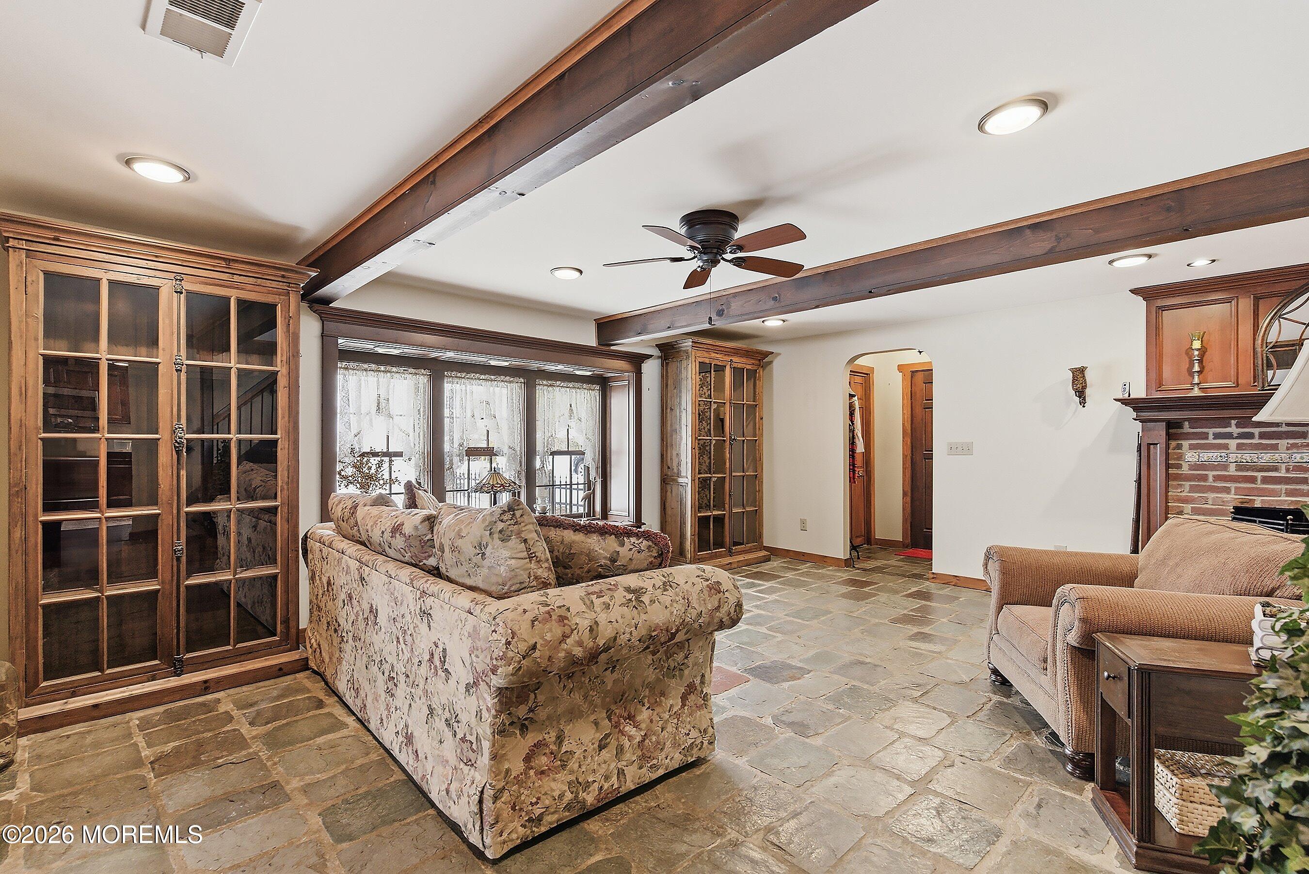 515 Carroll Fox Road Brick, NJ 08724 - Photo 30 of 60 a living room with furniture and a large window