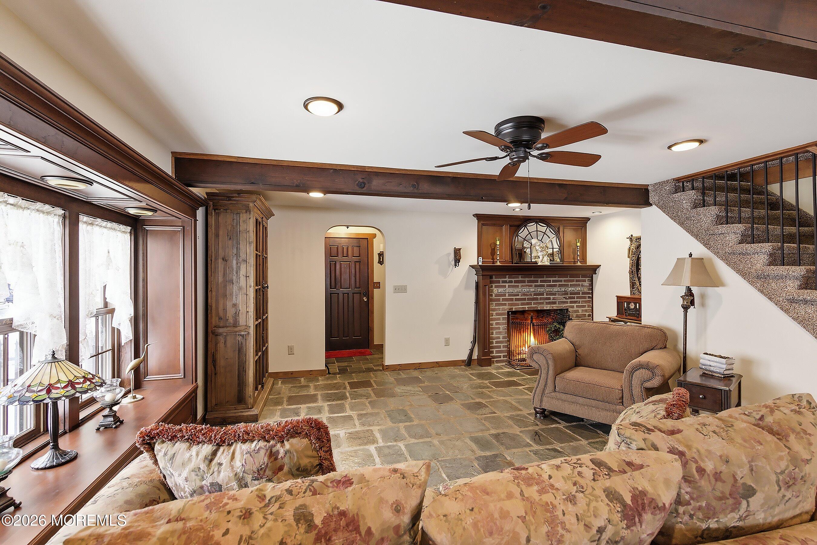 515 Carroll Fox Road Brick, NJ 08724 - Photo 31 of 60 a living room with furniture and a fireplace