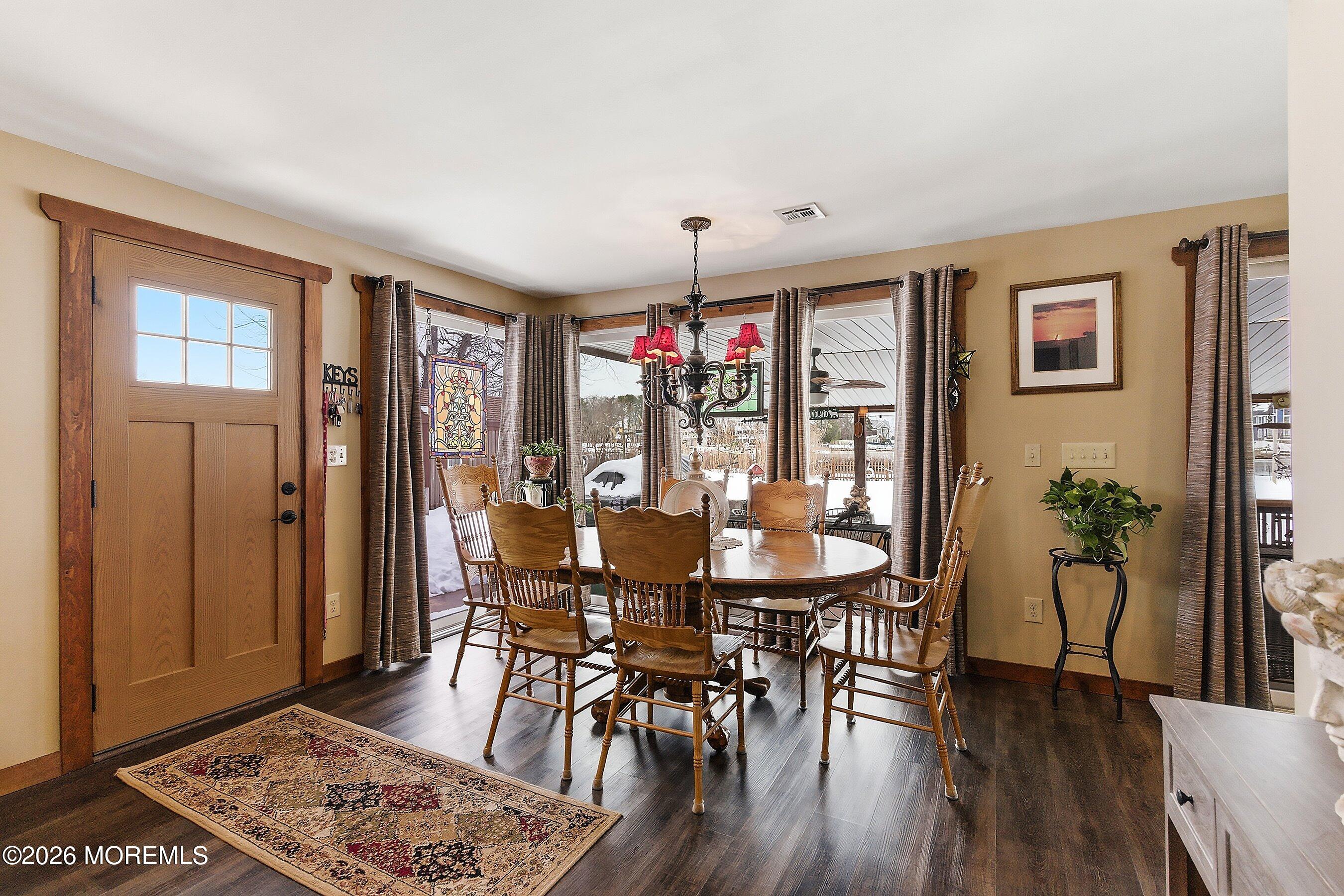 515 Carroll Fox Road Brick, NJ 08724 - Photo 38 of 60 a view of a dining room with furniture window and wooden floor