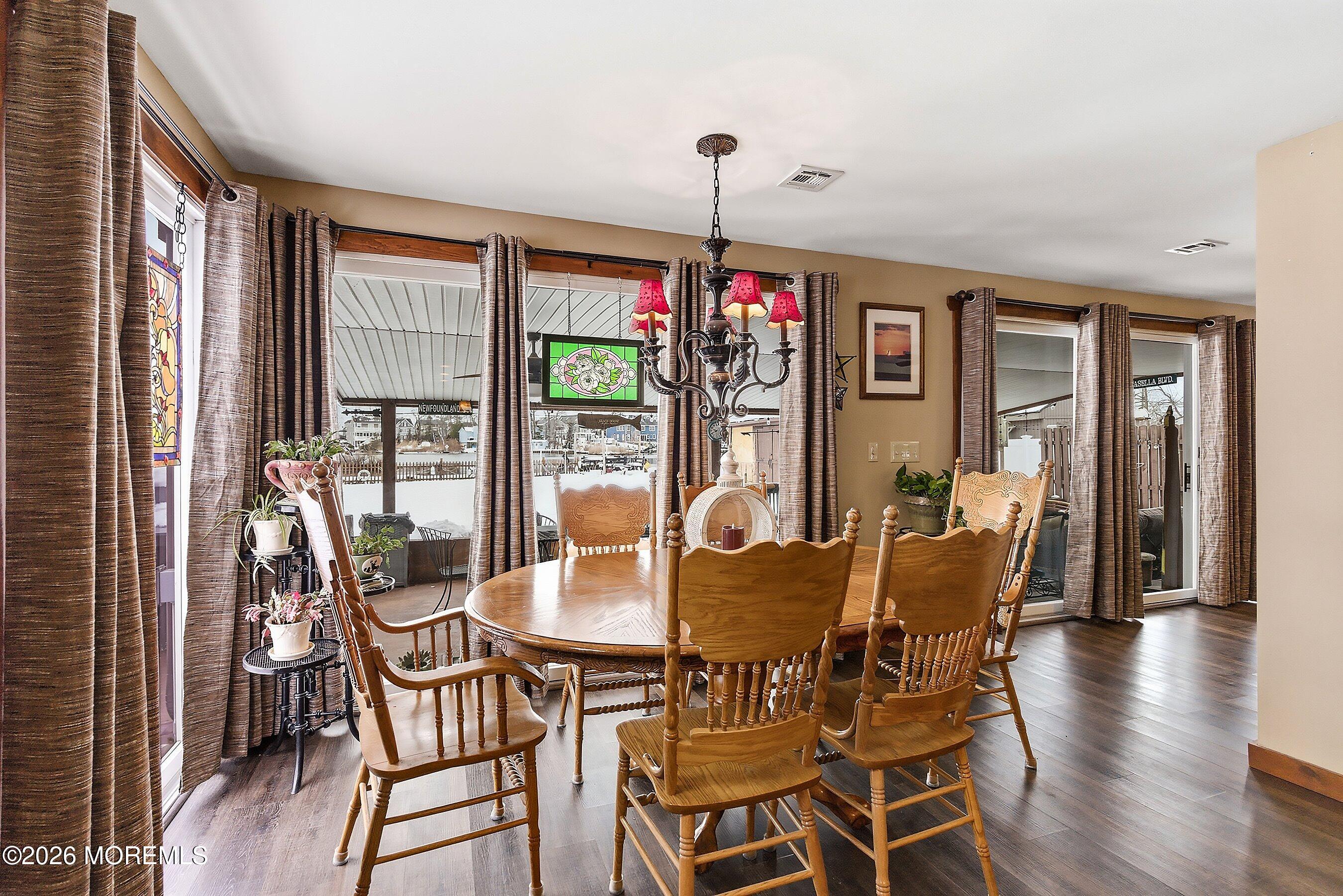 515 Carroll Fox Road Brick, NJ 08724 - Photo 39 of 60 a view of a dining room with furniture window and wooden floor