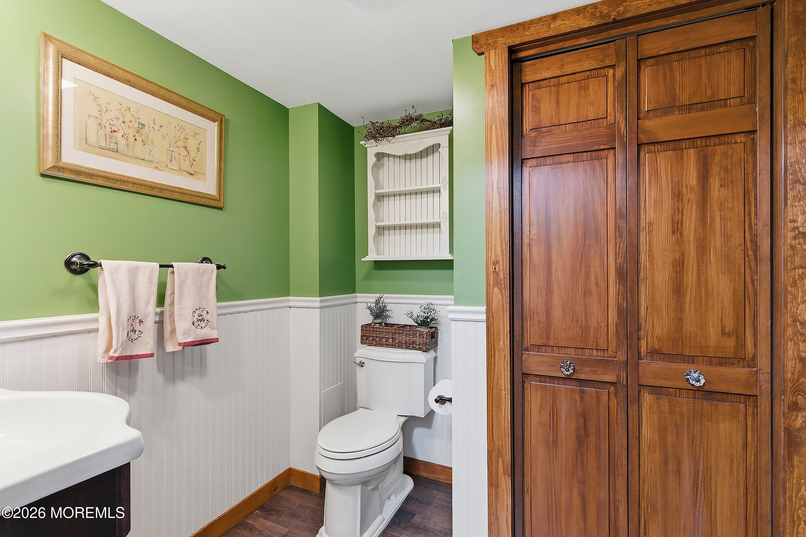 515 Carroll Fox Road Brick, NJ 08724 - Photo 45 of 60 a bathroom with a toilet a sink and tub