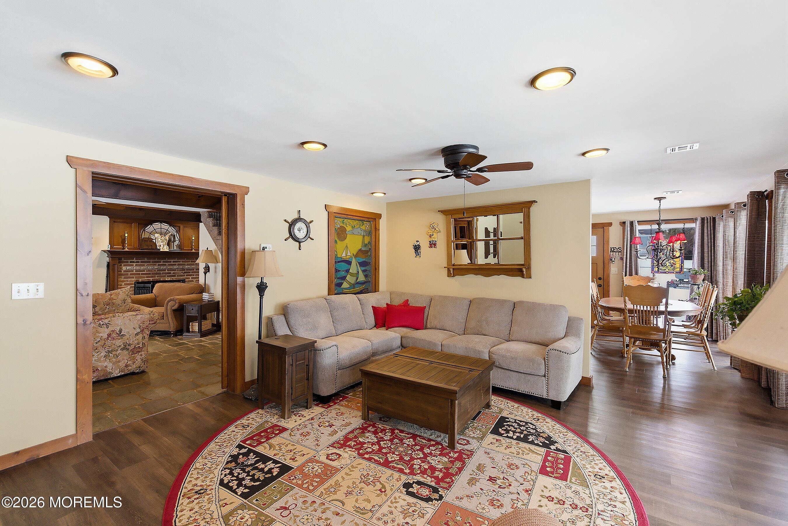 515 Carroll Fox Road Brick, NJ 08724 - Photo 50 of 60 a living room with furniture and wooden floor