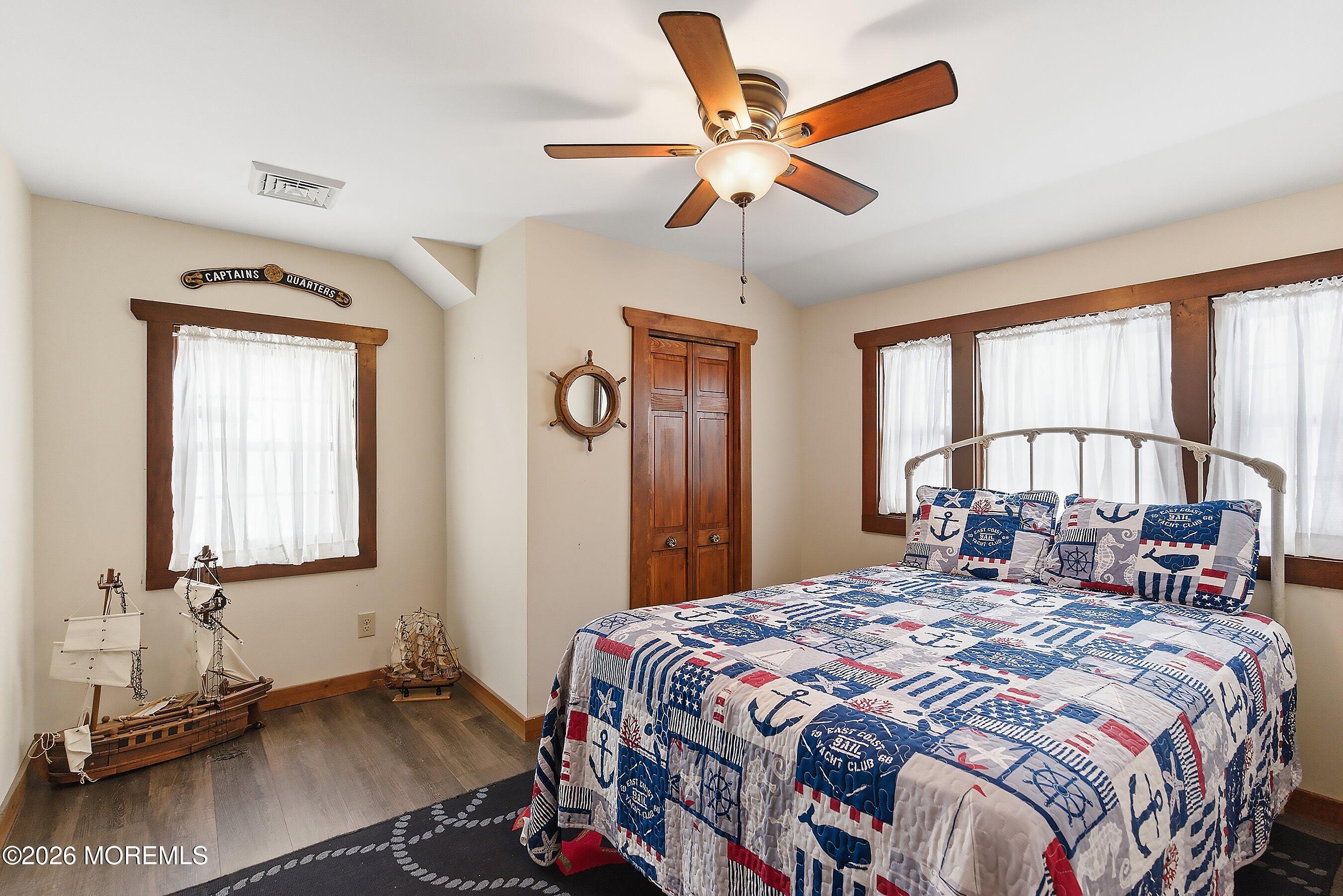 515 Carroll Fox Road Brick, NJ 08724 - Photo 58 of 60 a bedroom with a large bed and a large window