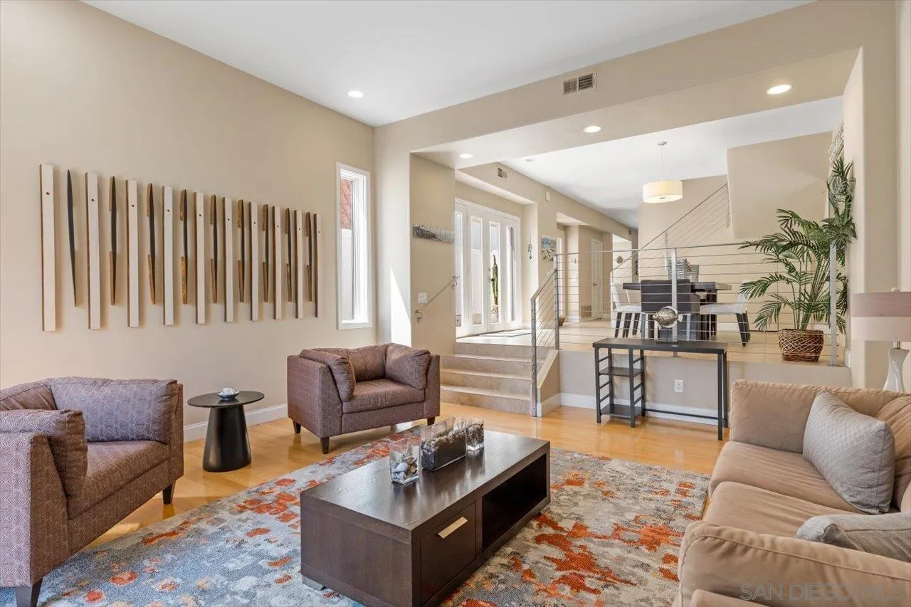 312 Bonair Street La Jolla, CA 92037 - Photo 2 of 40 a living room with furniture and a large window