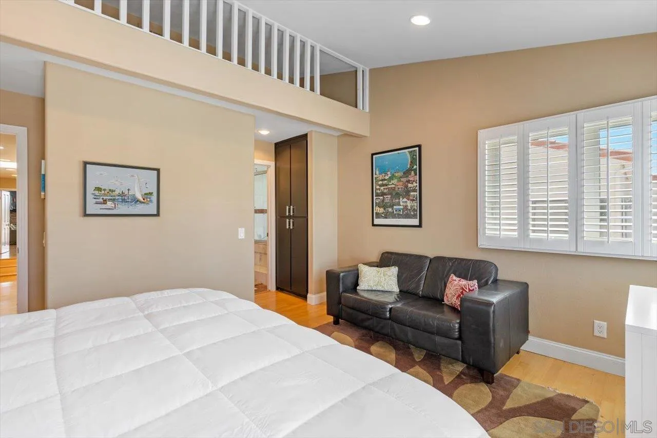 312 Bonair Street La Jolla, CA 92037 - Photo 25 of 40 a bedroom with furniture and a window