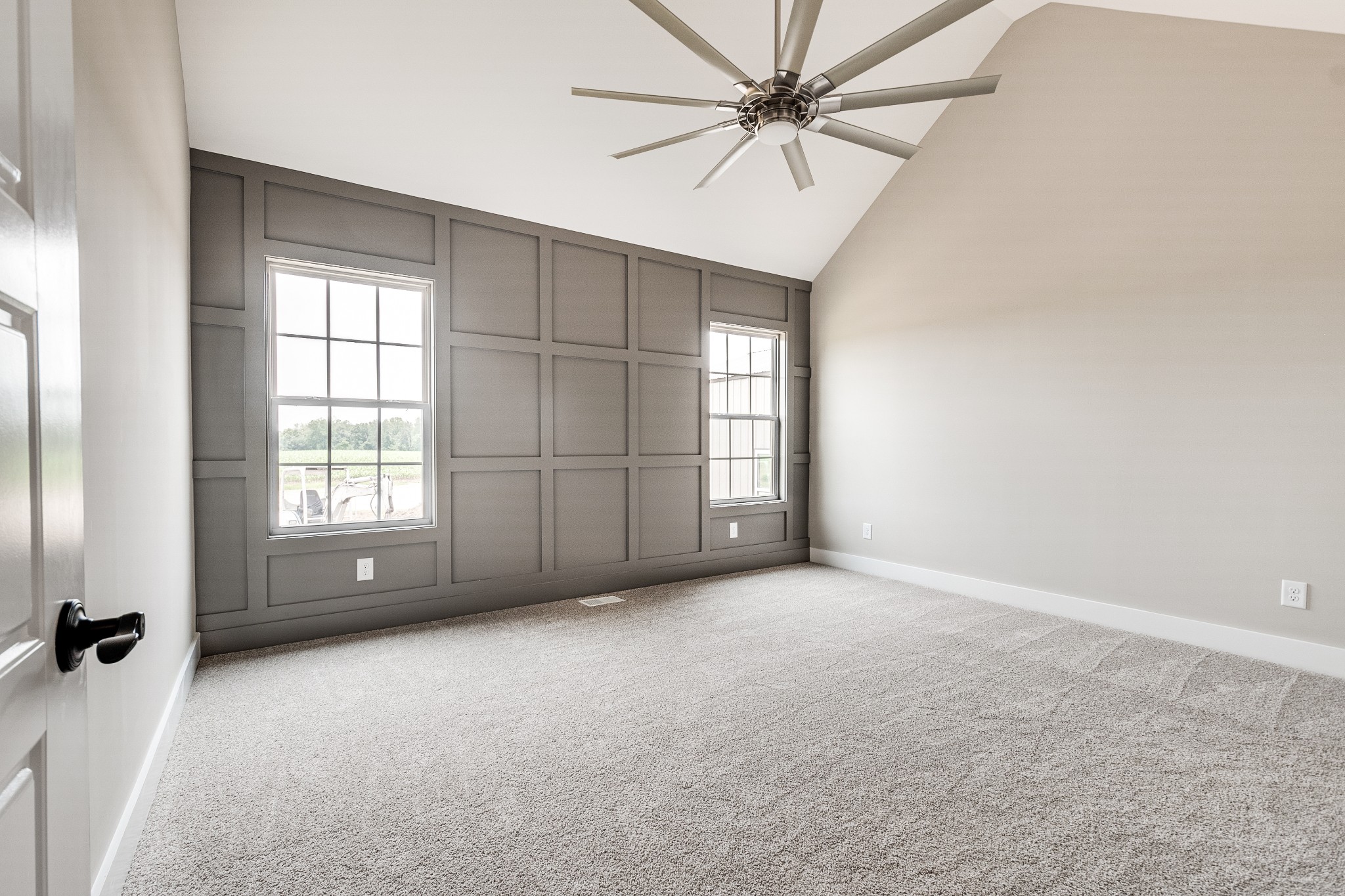 928 Butler Bridge Road Portland, TN 37148 - Photo 16 of 26 an empty room with windows and fan