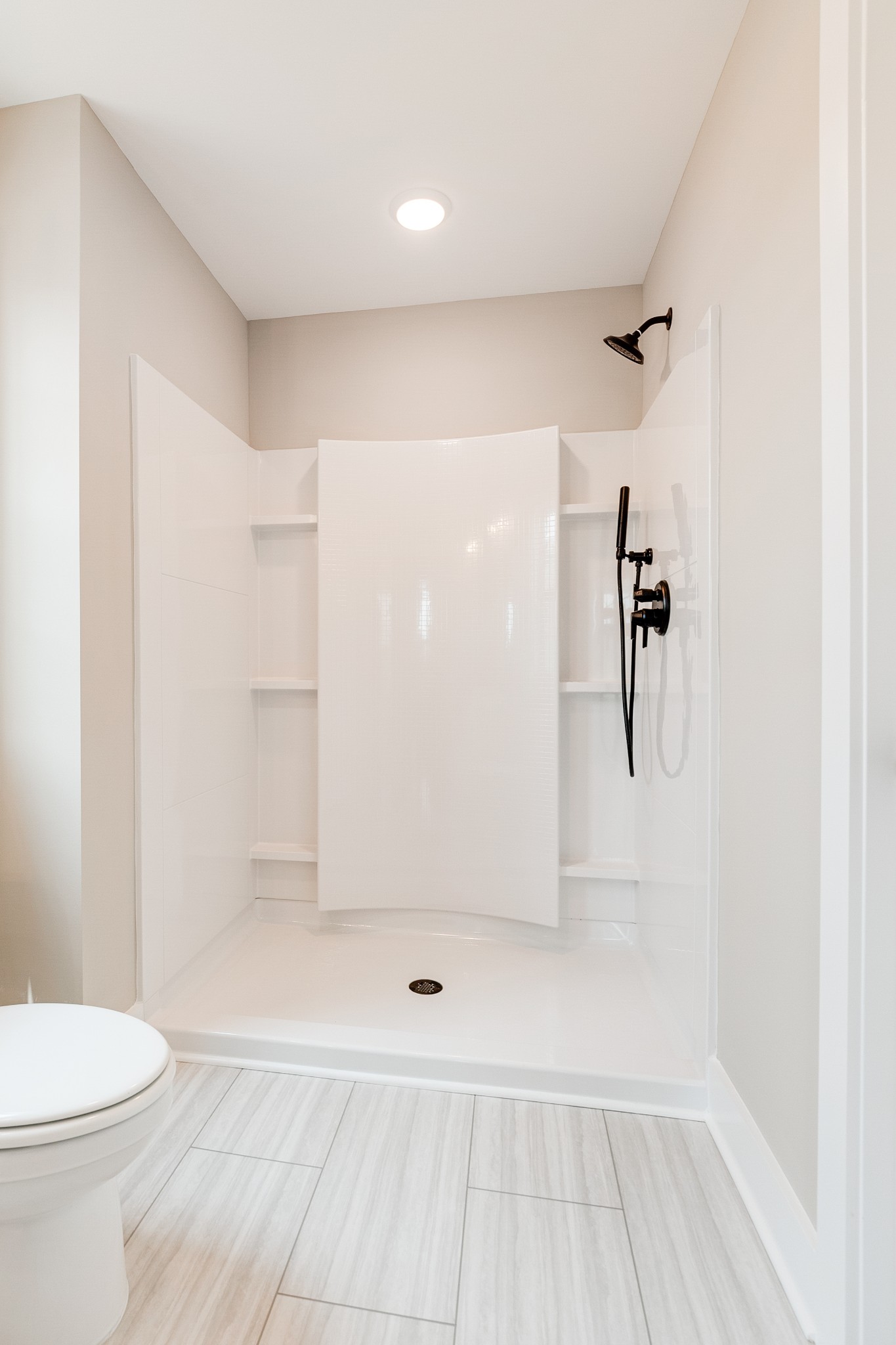 928 Butler Bridge Road Portland, TN 37148 - Photo 18 of 26 a bathroom with a shower and a toilet