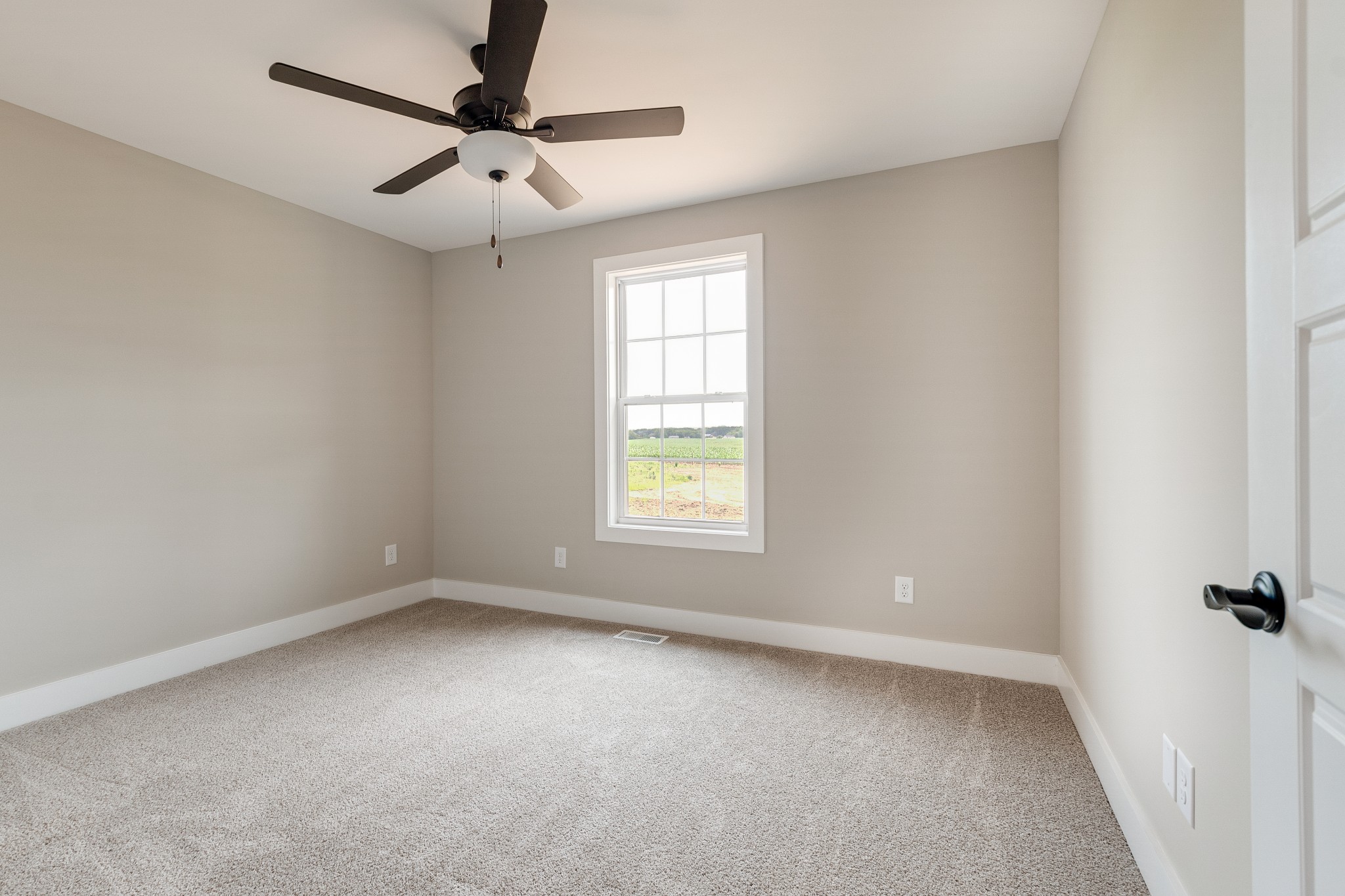 928 Butler Bridge Road Portland, TN 37148 - Photo 21 of 26 a view of an empty room with a window