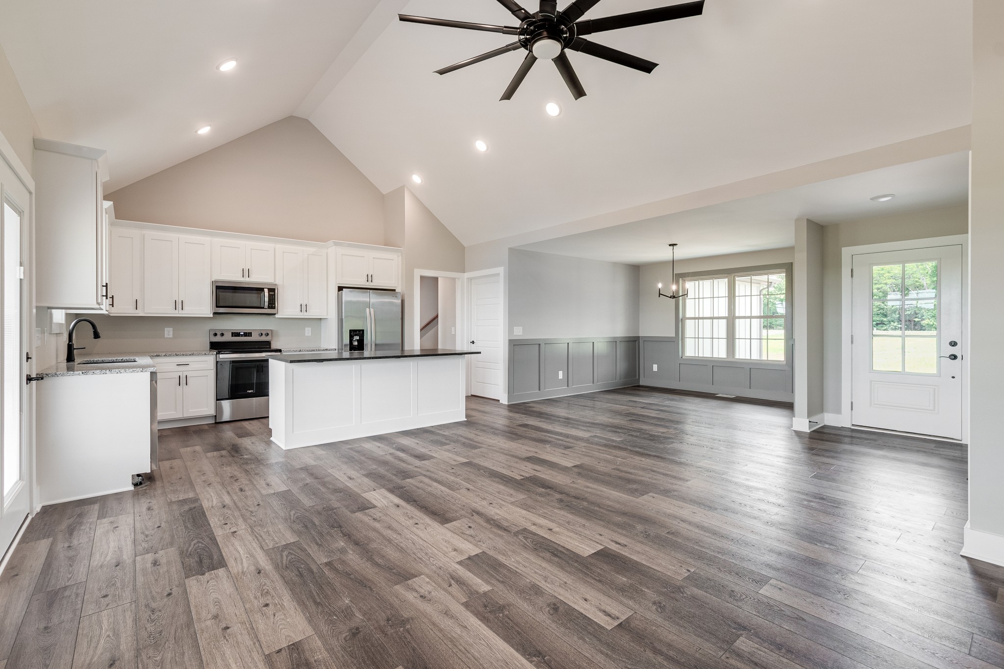 928 Butler Bridge Road Portland, TN 37148 - Photo 7 of 26 a view of a kitchen with a sink and a stove top oven