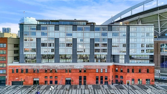 a front view of a building with glass windows